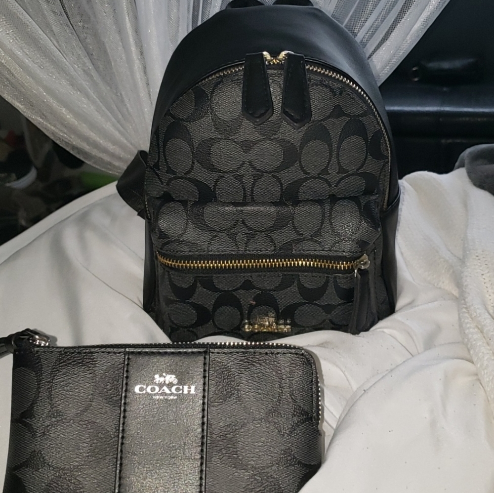 Black Mini Charlie backpack by Coach.